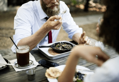 A man eats the right food for power